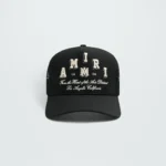 AMIRI VARSITY TRUCKER HAT