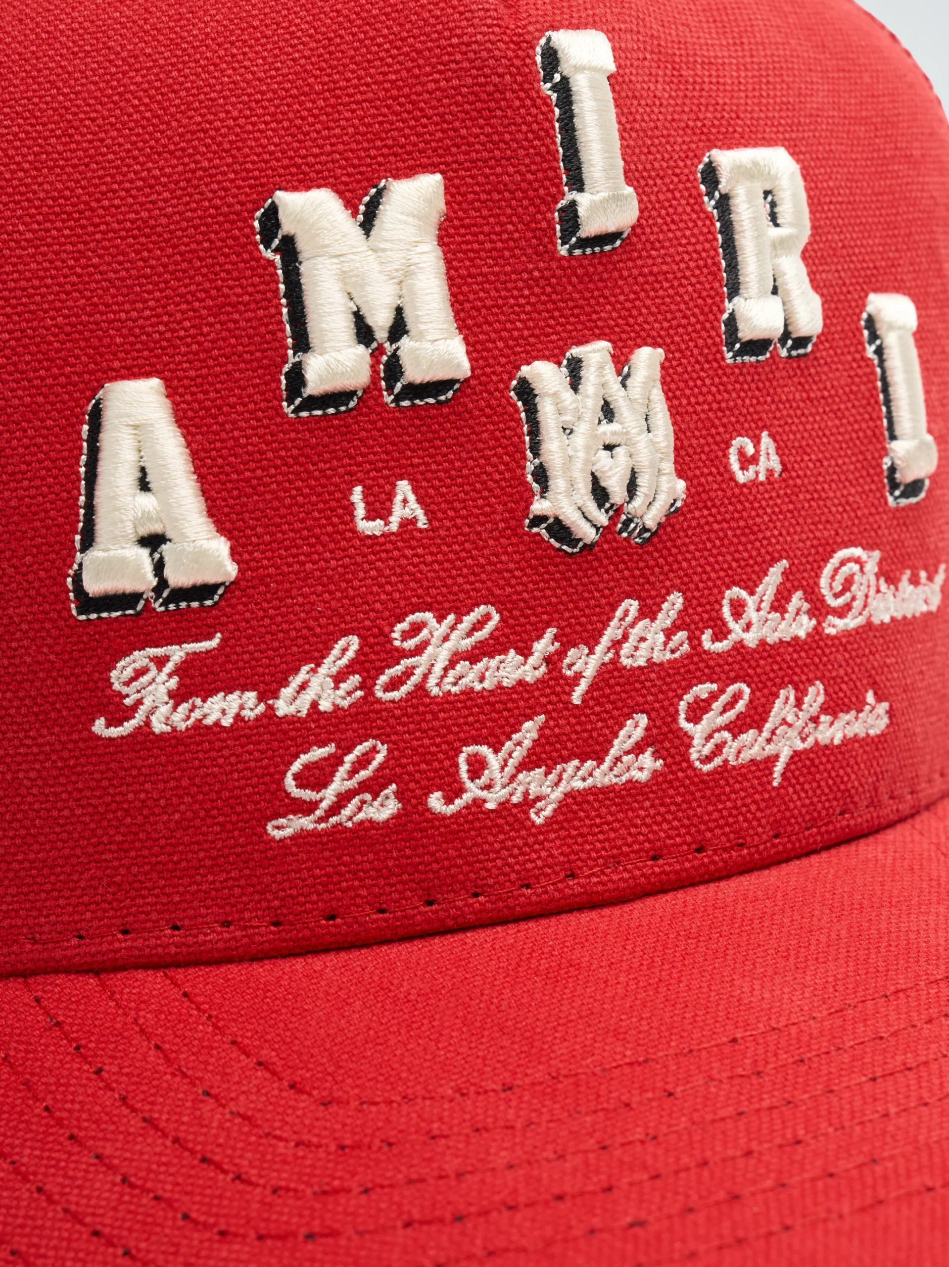 AMIRI VARSITY TRUCKER HAT