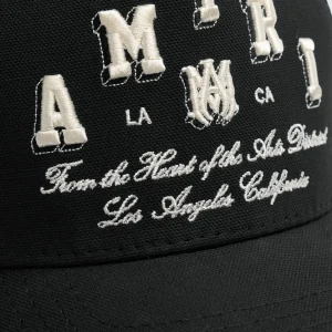 AMIRI VARSITY TRUCKER HAT