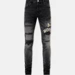 amiri-hollywood-repaired-jean-faded-black